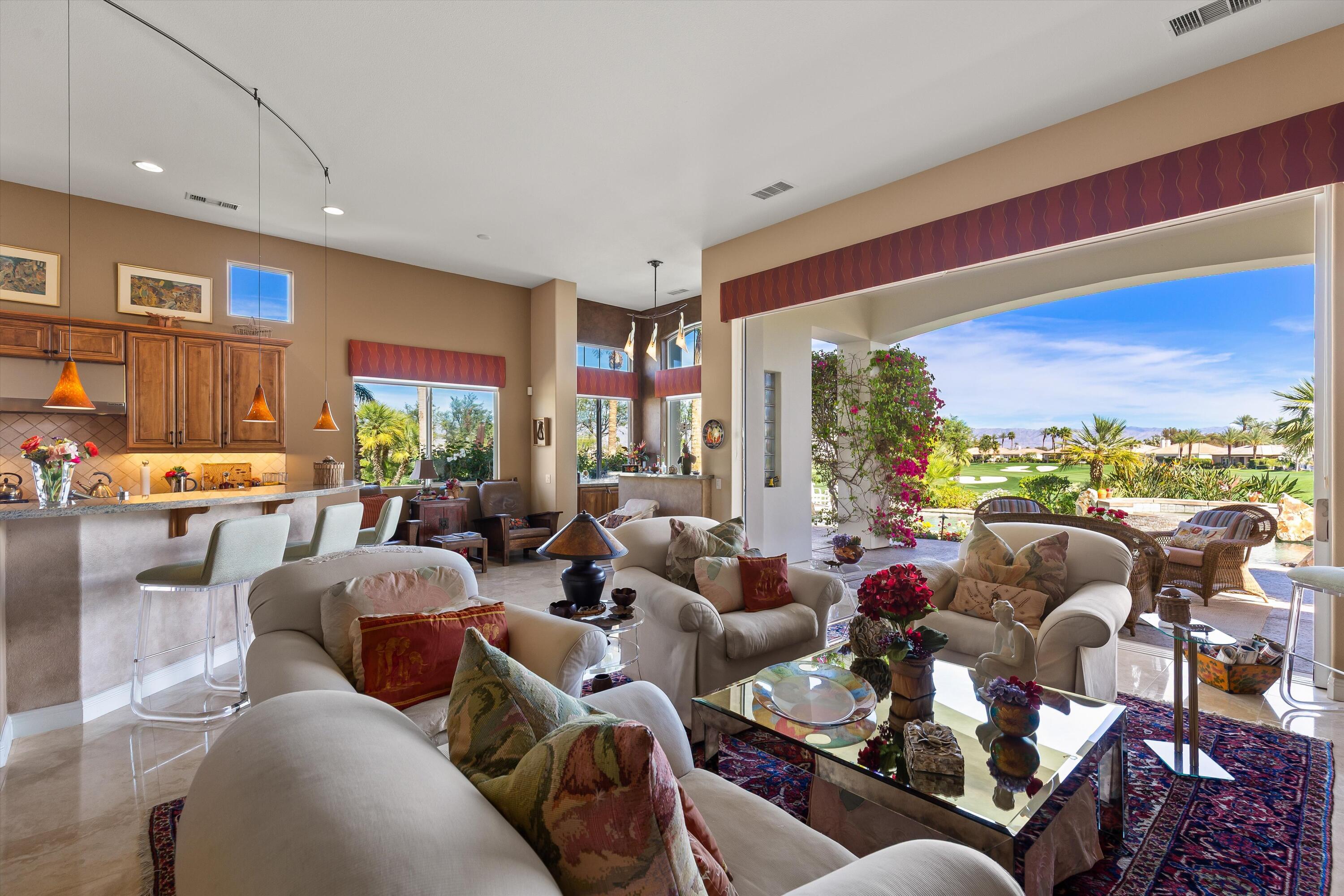 80460 Torreon Way La Quinta, CA 92253 - Photo 16 of 32 a living room with furniture and a large window