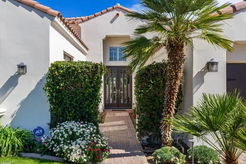 a plant that is in front of a house