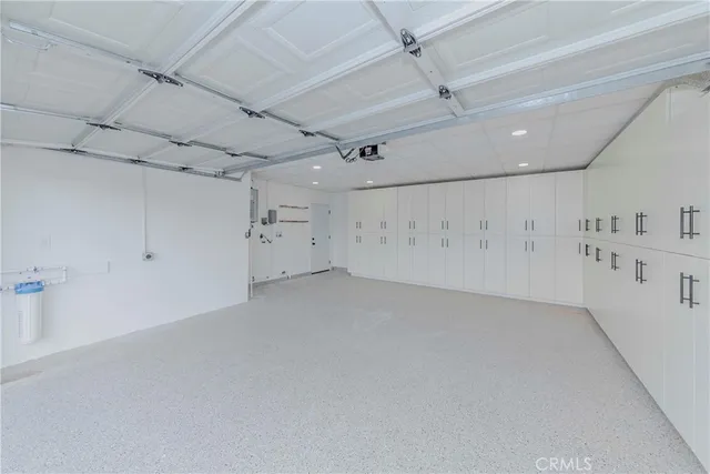 an empty room with white walls