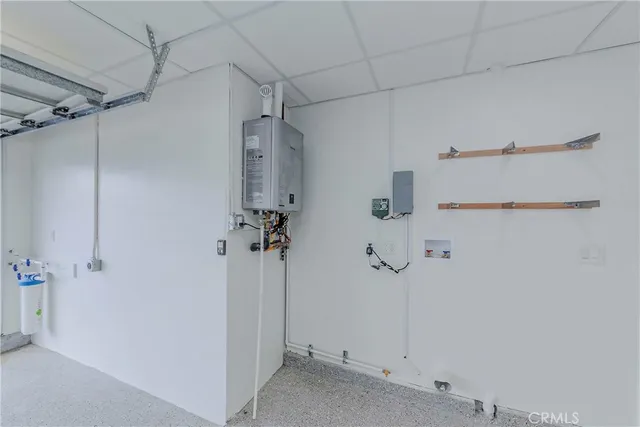 a view of a house with a tub and a yard