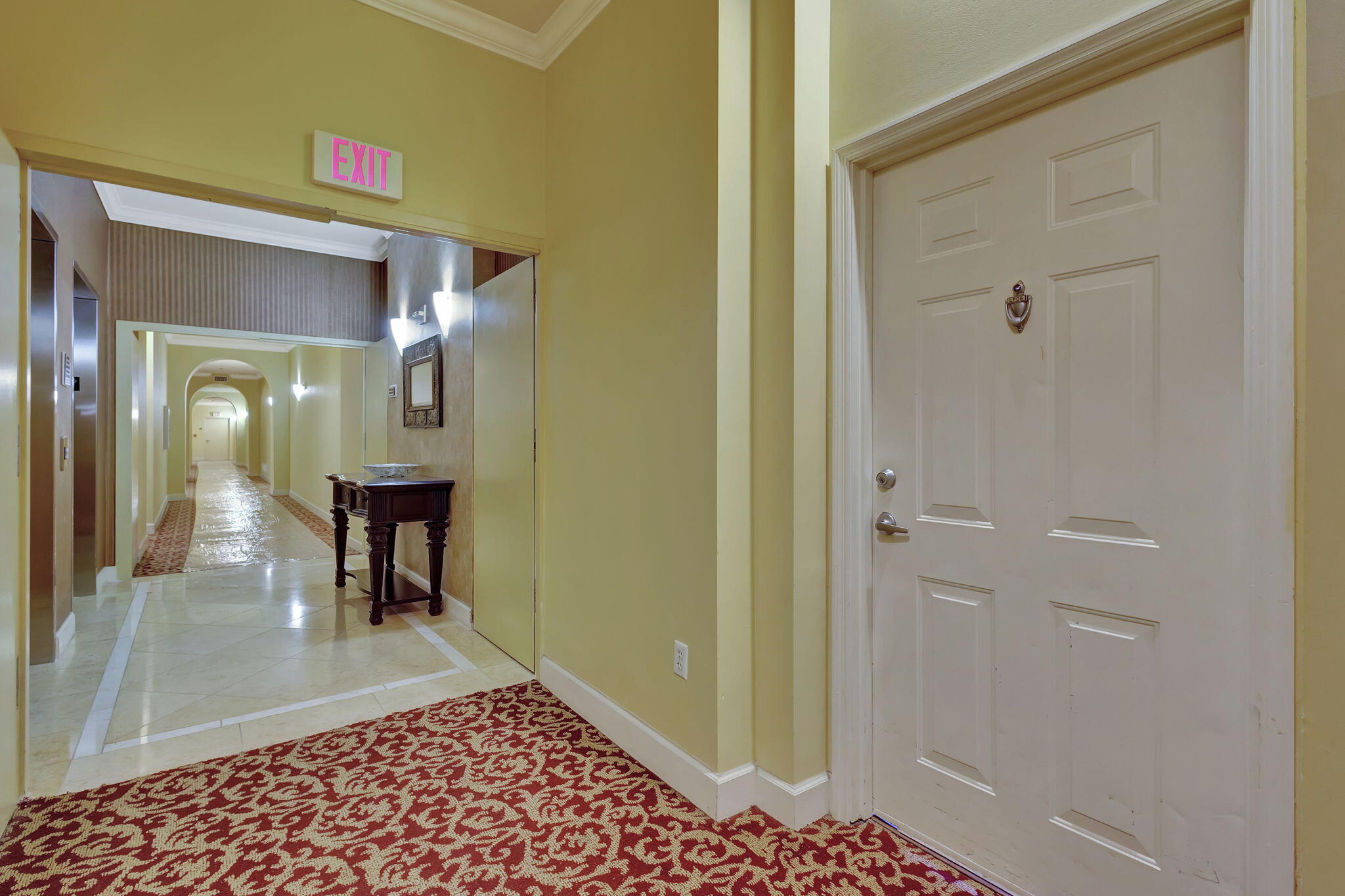 616 Clearwater Park Road, Unit LP06 West Palm Beach, FL 33401 - Photo 1 of 29 a view of a hallway with a furniture and a livingroom