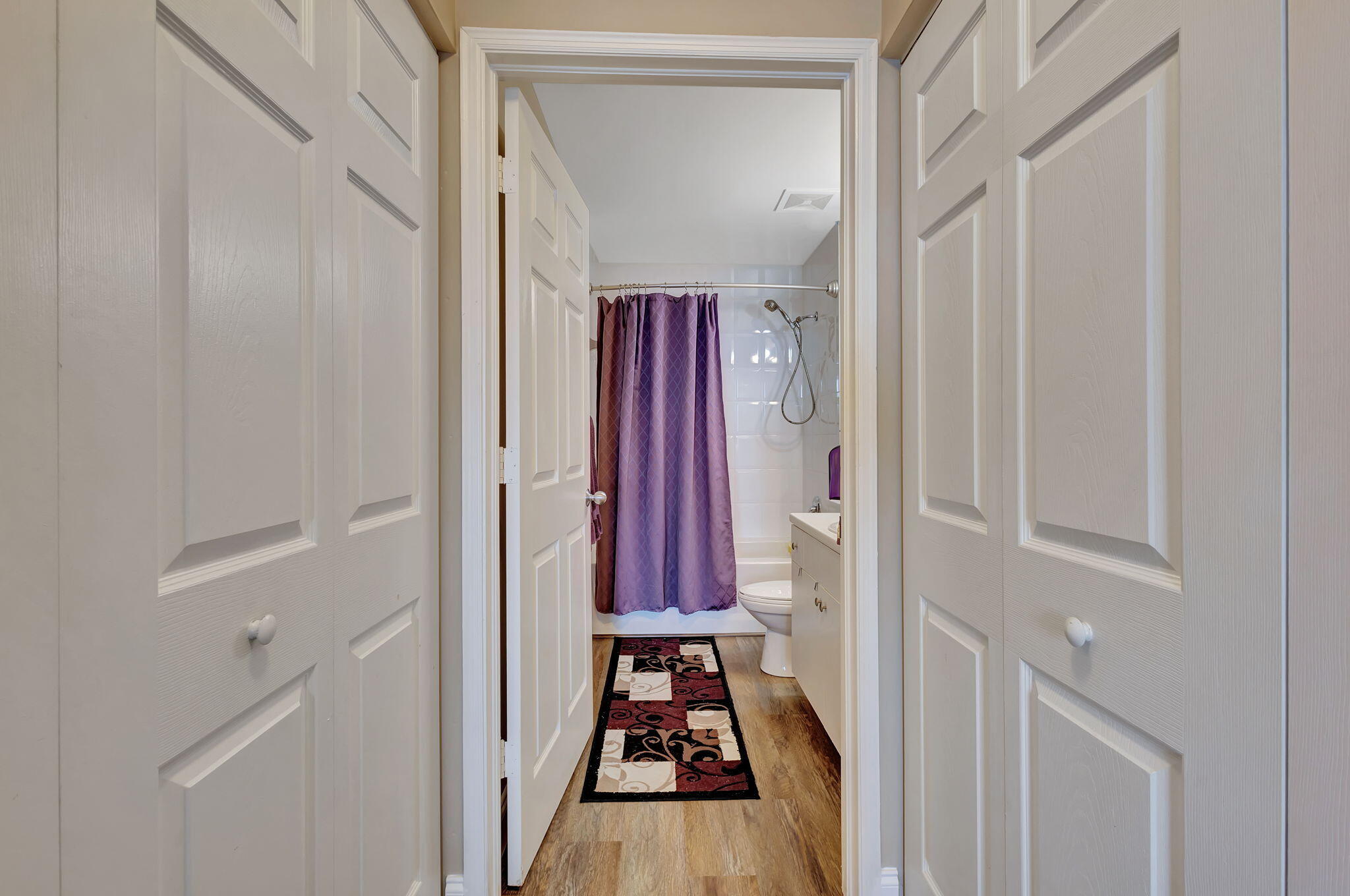 616 Clearwater Park Road, Unit LP06 West Palm Beach, FL 33401 - Photo 14 of 29 a view of a hallway with white walls and stairs