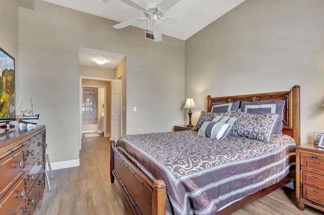 a bedroom with a bed and a dresser