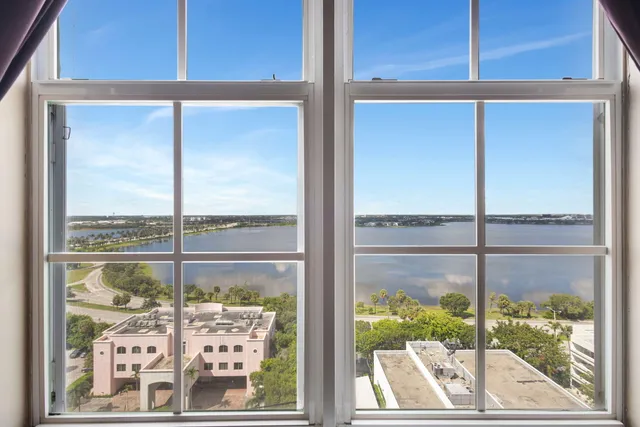 a view of a room with a large window