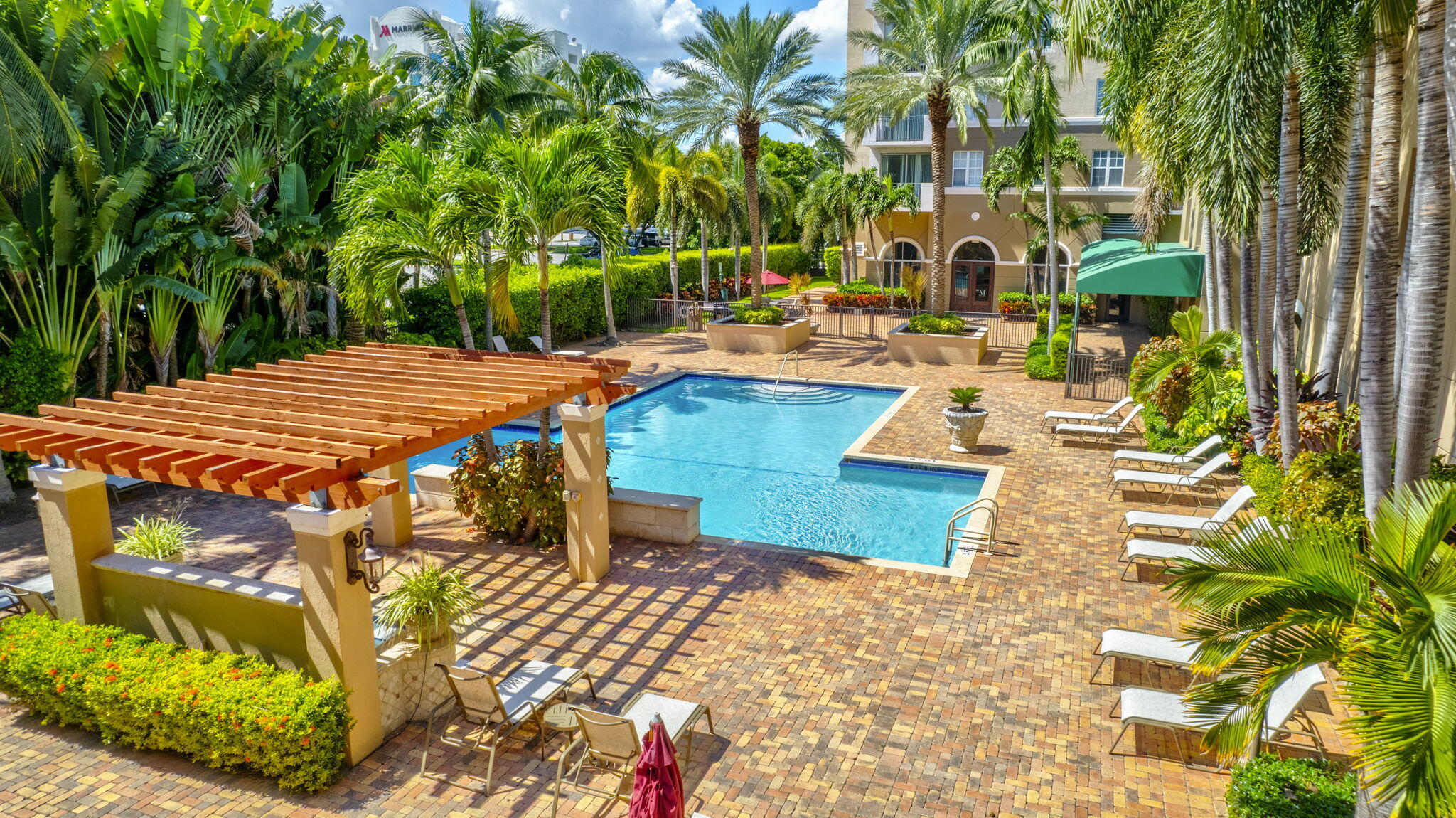 616 Clearwater Park Road, Unit LP06 West Palm Beach, FL 33401 - Photo 22 of 29 a view of a swimming pool with a patio