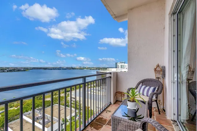 a view of balcony with furniture