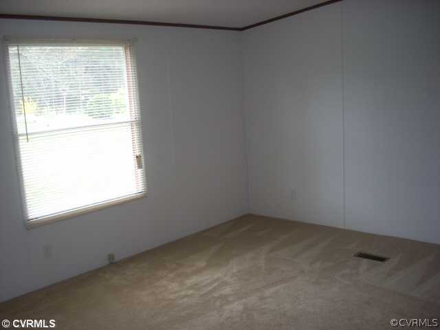 331 State Rte F 189 Louisa, VA 23093 - Photo 12 of 12 an empty room with a window