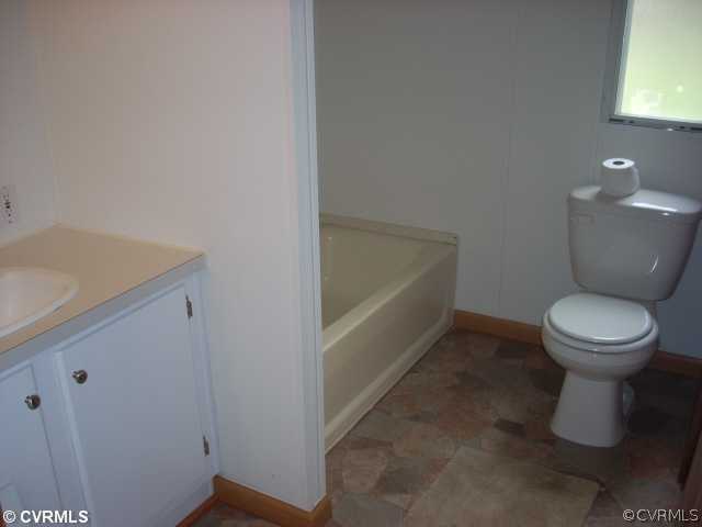 331 State Rte F 189 Louisa, VA 23093 - Photo 2 of 12 a bathroom with a toilet and a sink