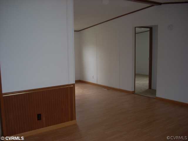 331 State Rte F 189 Louisa, VA 23093 - Photo 9 of 12 an empty room with a door