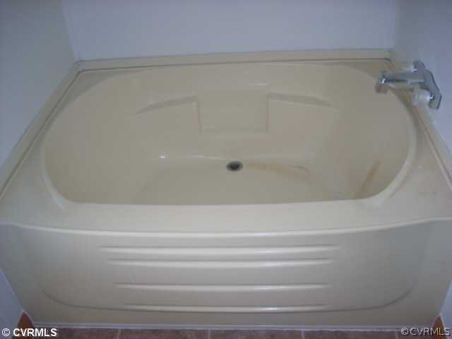 331 State Rte F 189 Louisa, VA 23093 - Photo 10 of 12 a close up of a bathtub in a bathroom