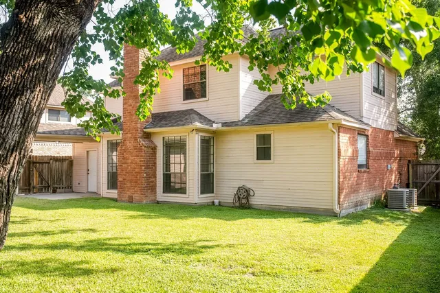 a view of a room with a chandelier