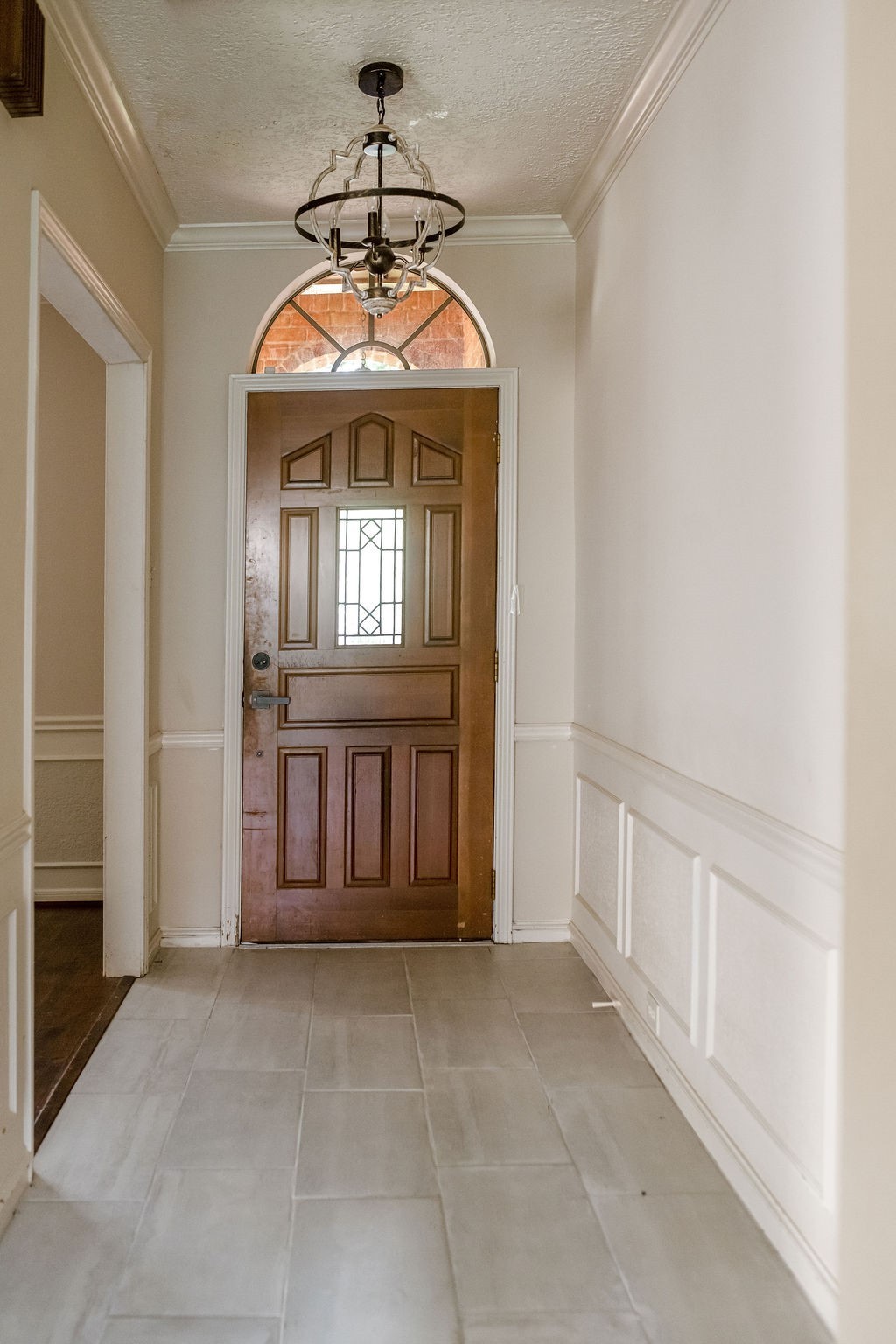 18319 Arbor Terrace Drive Spring, TX 77388 - Photo 18 of 34 a view of a room with a chandelier