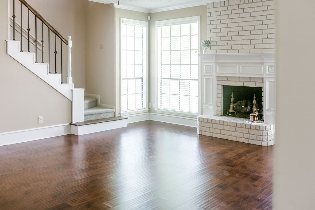 18319 Arbor Terrace Drive Spring, TX 77388 - Photo 3 of 34 a view of an empty room with wooden floor and a window