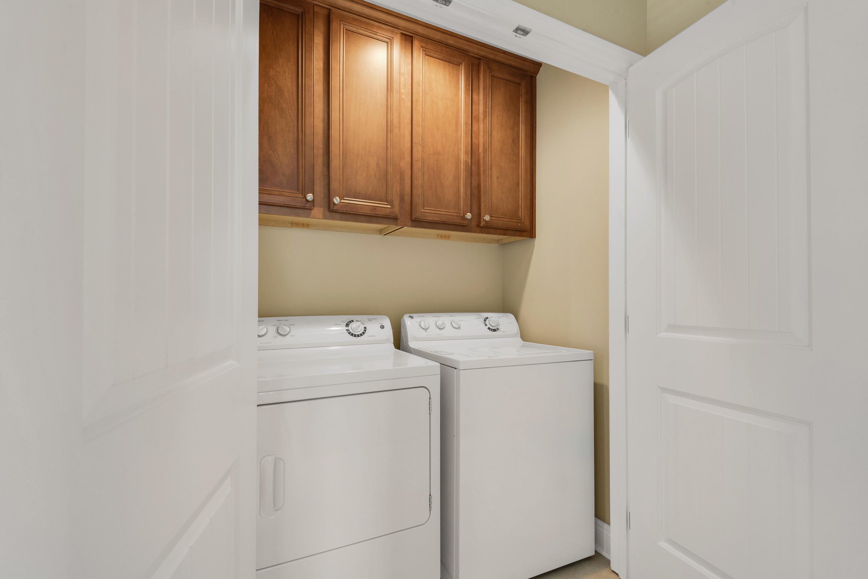 69 Topsail Drive Santa Rosa Beach, FL 32459 - Photo 28 of 34 a utility room with dryer and washer