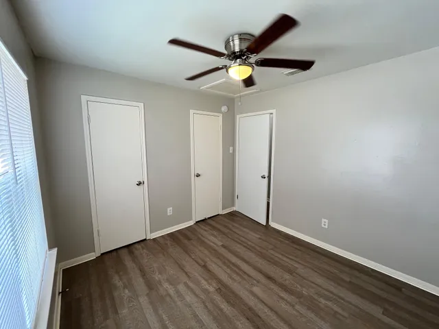 a view of a bathroom from a hallway