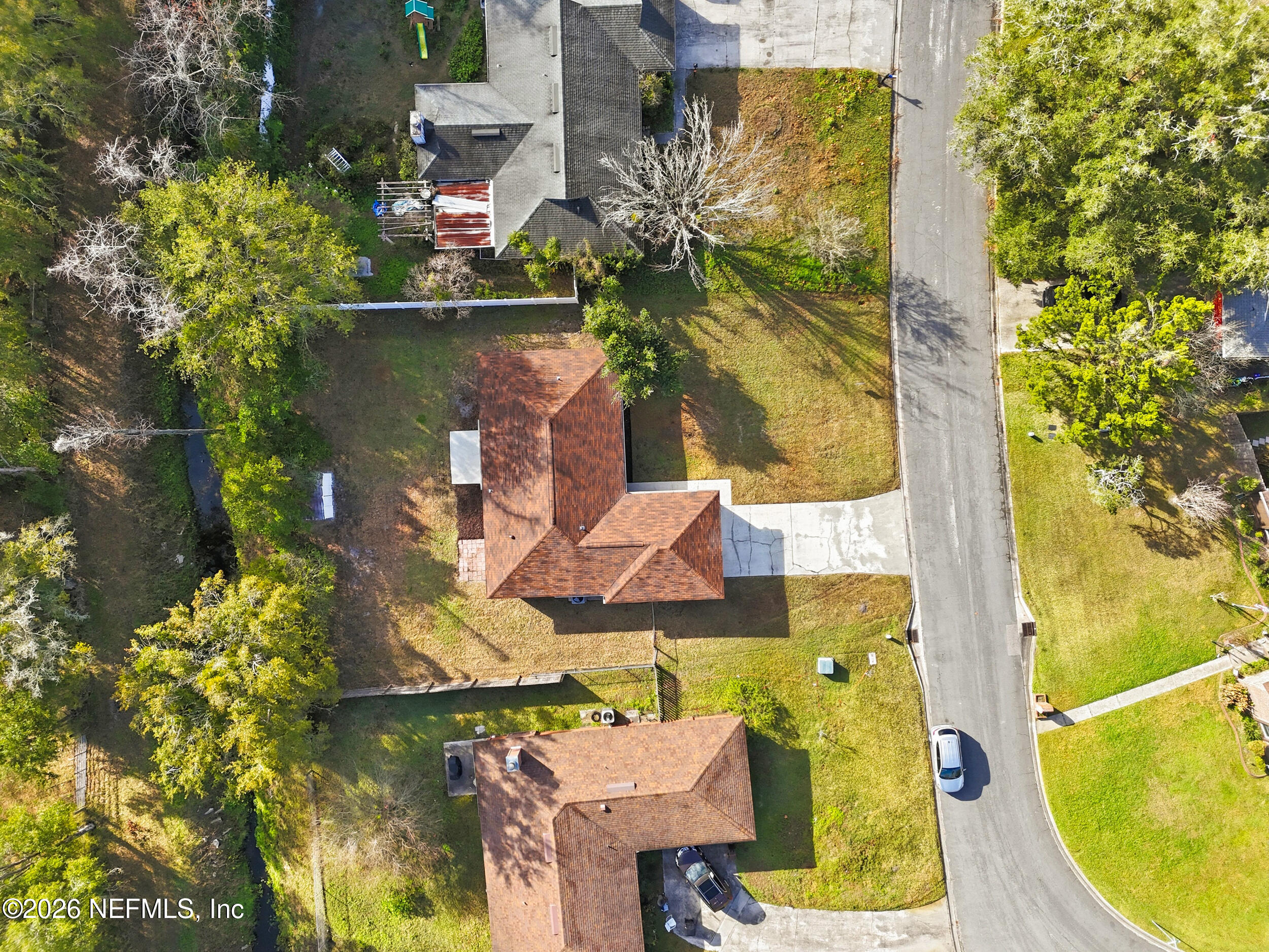 2171 Carter Braxton Road Orange Park, FL 32073 - Photo 21 of 39 aerial view of a house with a swimming pool