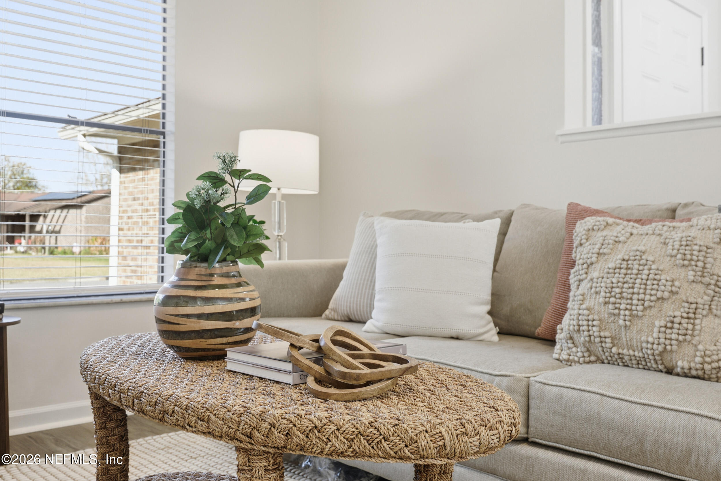 2171 Carter Braxton Road Orange Park, FL 32073 - Photo 28 of 39 a living room with furniture and a potted plant