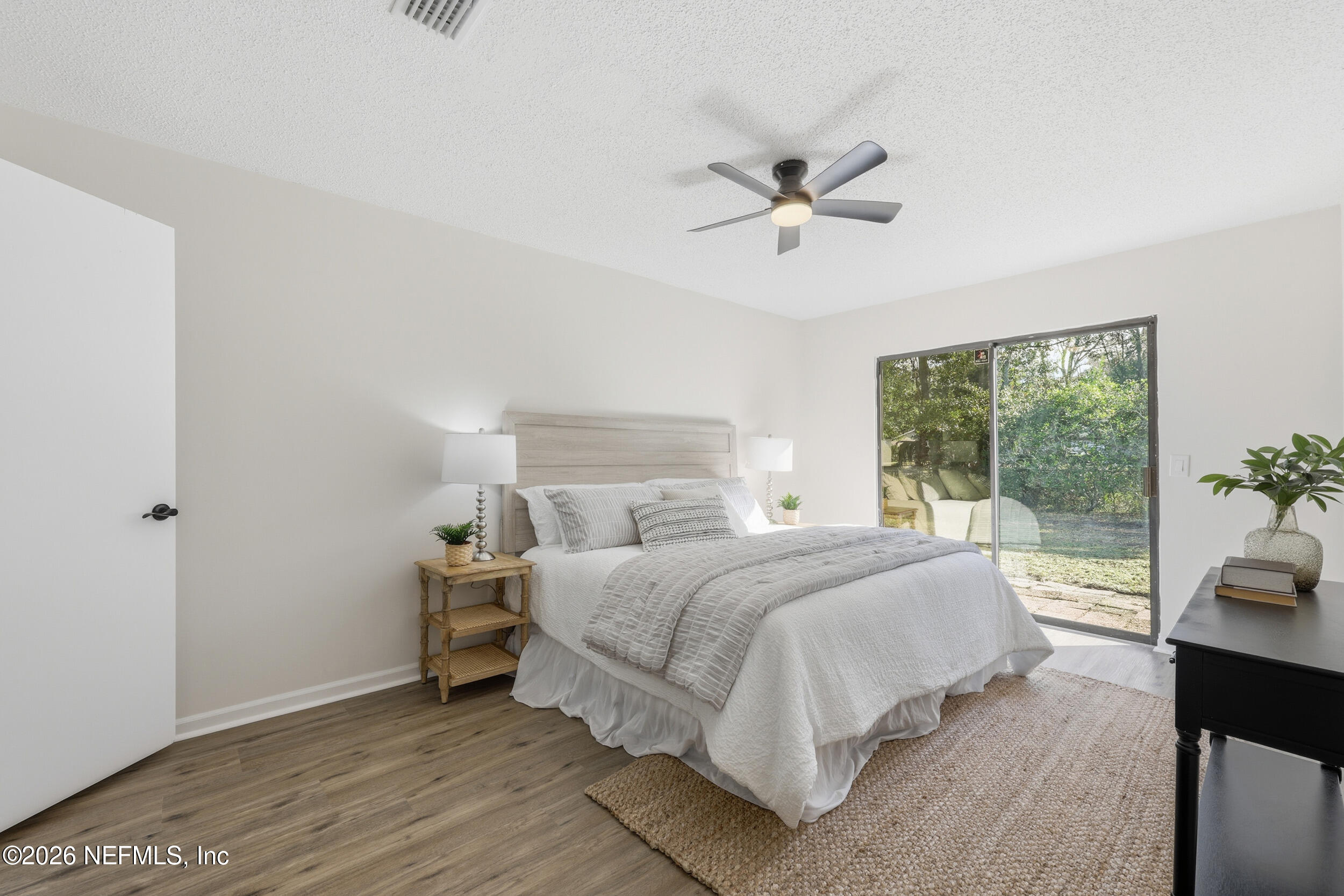 2171 Carter Braxton Road Orange Park, FL 32073 - Photo 36 of 39 a bedroom with a bed and a large window