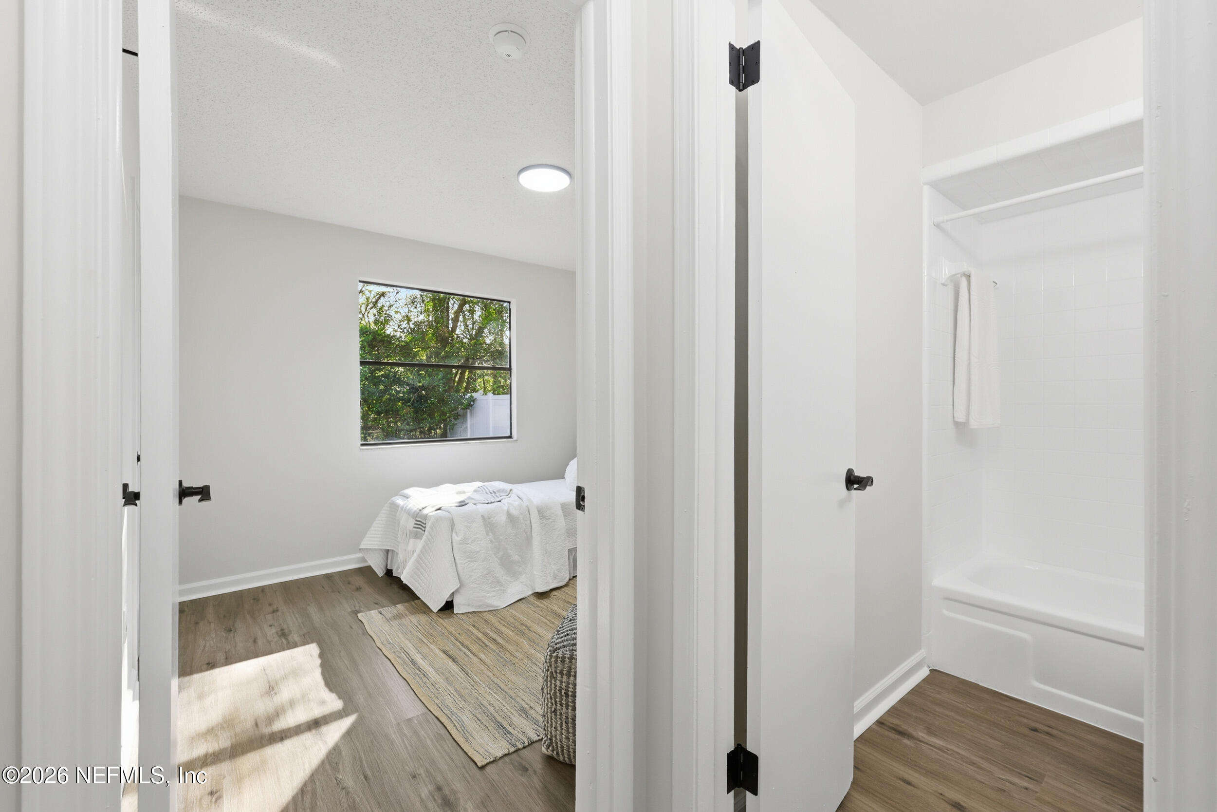 2171 Carter Braxton Road Orange Park, FL 32073 - Photo 38 of 39 a bedroom with a bed and window