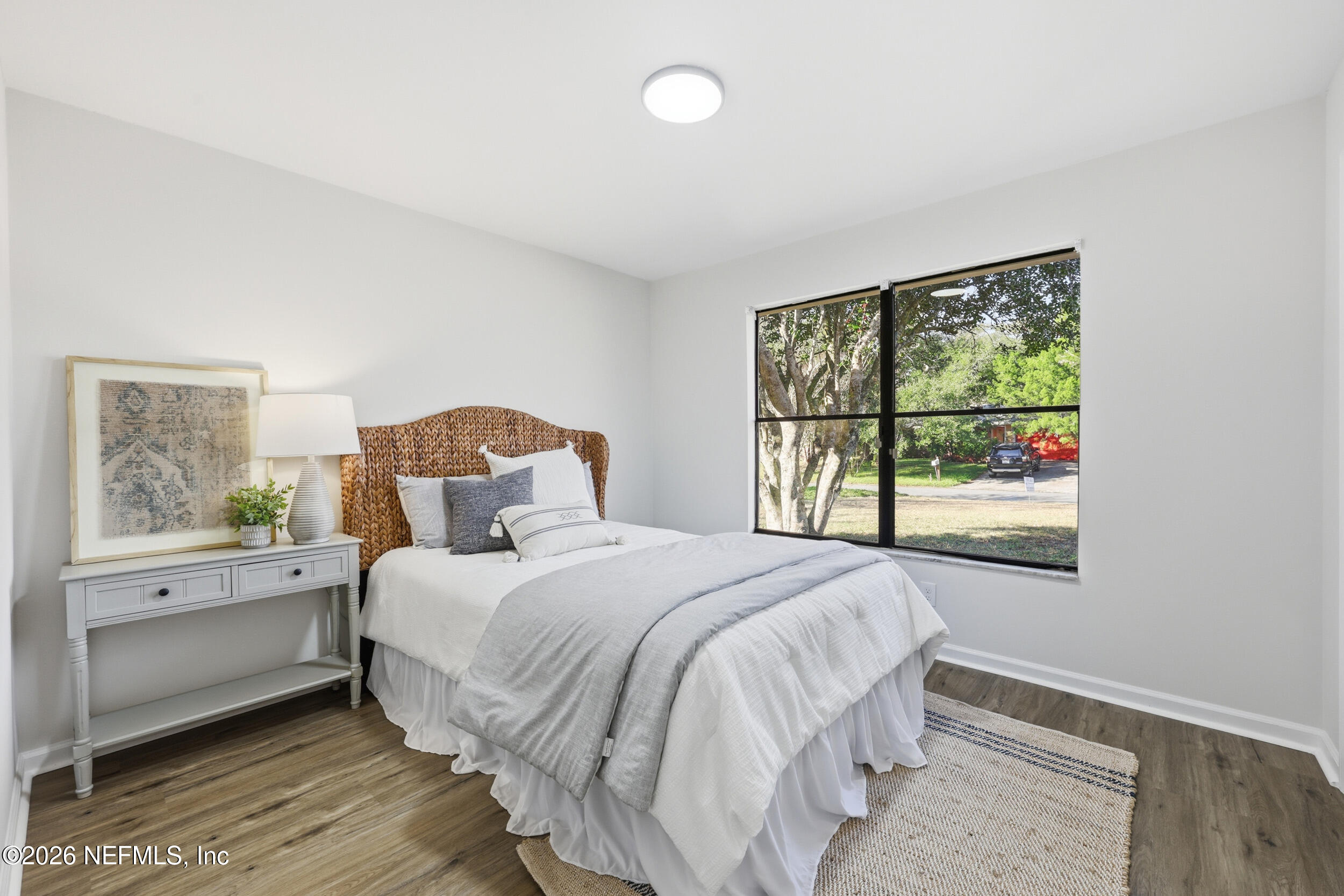 2171 Carter Braxton Road Orange Park, FL 32073 - Photo 9 of 39 a bedroom with a large bed and a window