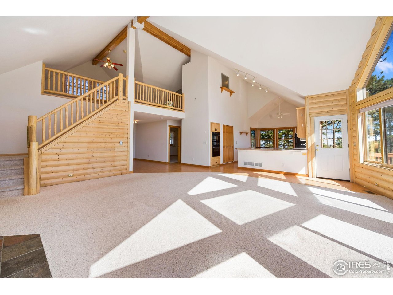 965 Stone Mountain Ranch Road Loveland, CO 80537 - Photo 49 of 49 Vaulted ceilings and open floorplan