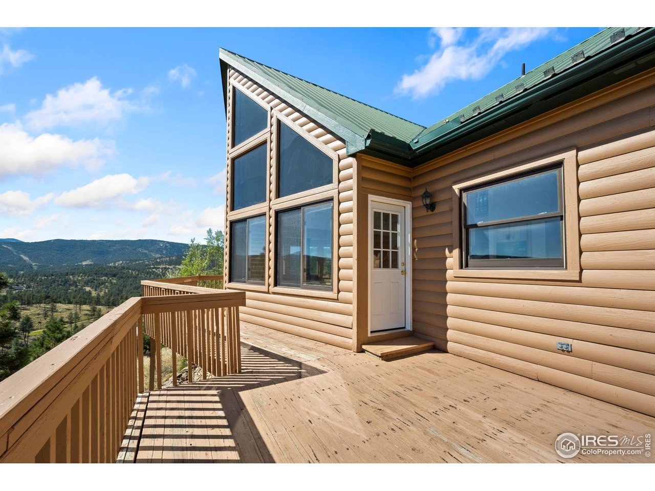 965 Stone Mountain Ranch Road Loveland, CO 80537 - Photo 36 of 49 Back deck with views in every direction