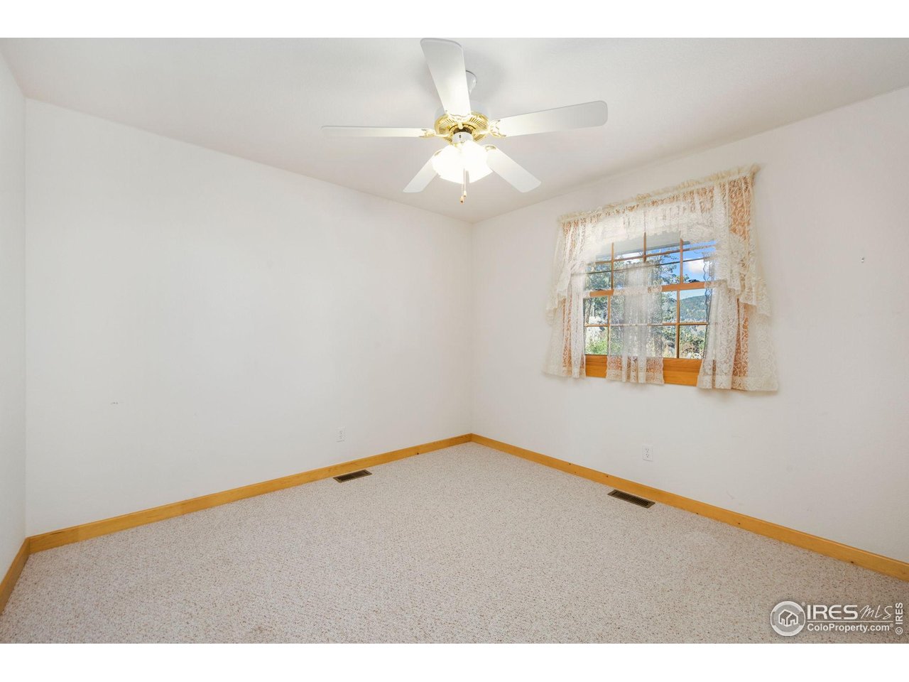 965 Stone Mountain Ranch Road Loveland, CO 80537 - Photo 9 of 49 Bedroom 1 on main level