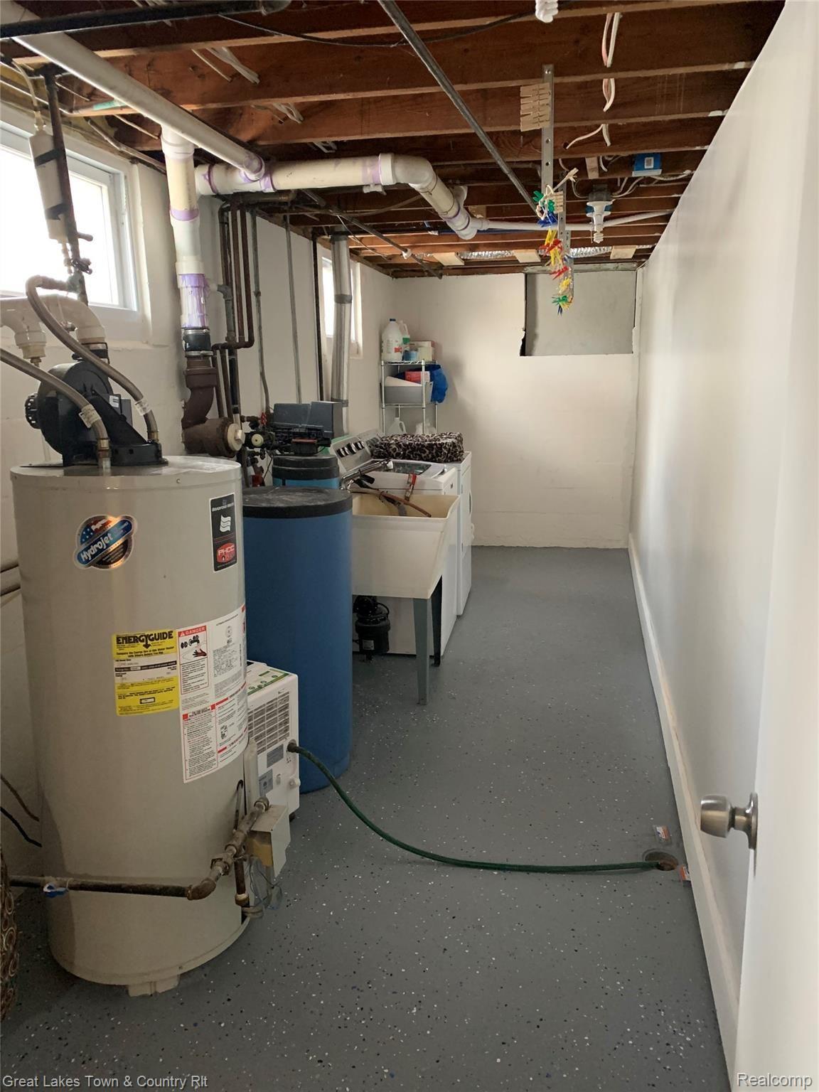 645 North Lake George Road Attica, MI 48412 - Photo 24 of 34 lg laundry.JPG
