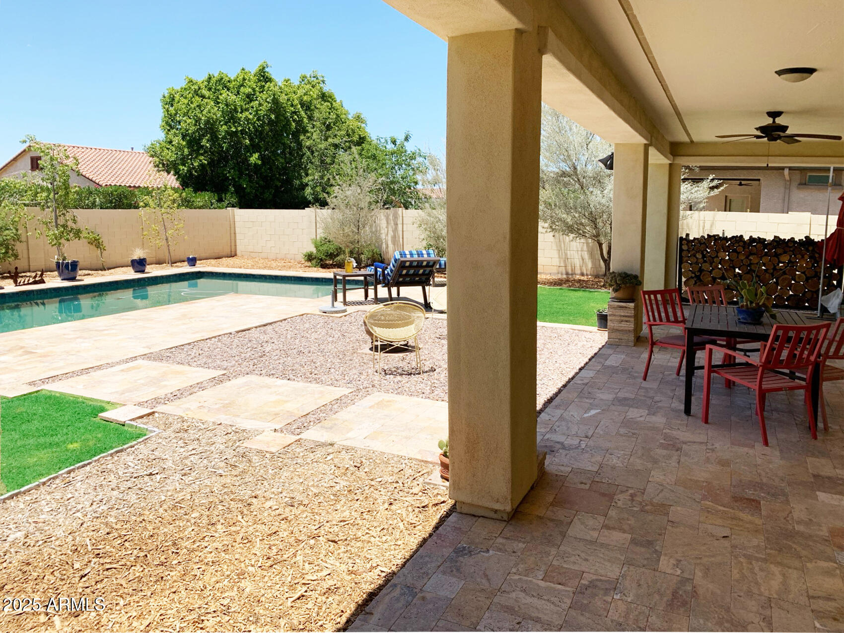4836 South Covalent Lane Mesa, AZ 85212 - Photo 15 of 66 a view of a porch with furniture and a yard
