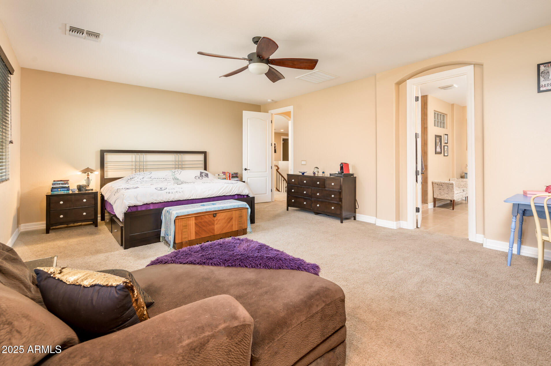 4836 South Covalent Lane Mesa, AZ 85212 - Photo 20 of 66 a bedroom with a bed and wooden floor