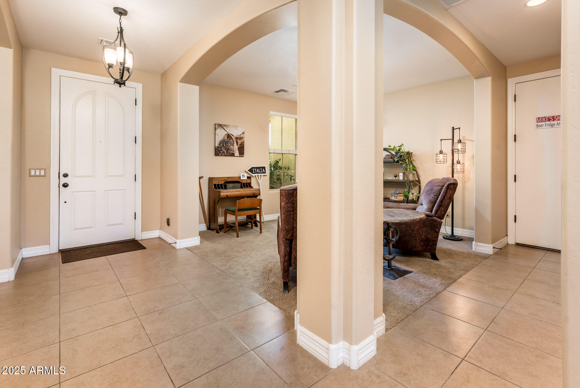 4836 South Covalent Lane Mesa, AZ 85212 - Photo 29 of 66 a view of a livingroom with furniture and a livingroom