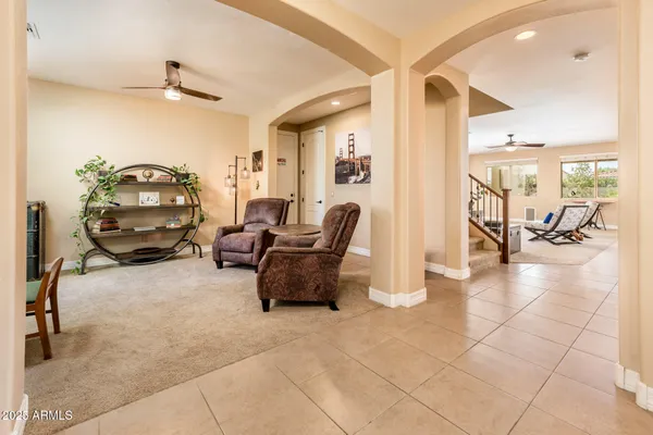 a bed room with two bed and a dresser