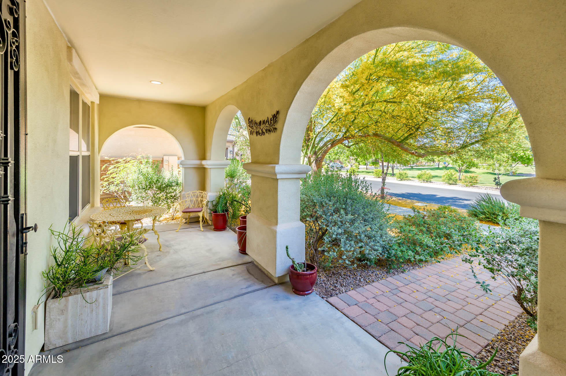 4836 South Covalent Lane Mesa, AZ 85212 - Photo 4 of 66 a view of hall with wooden floor and a potted plant