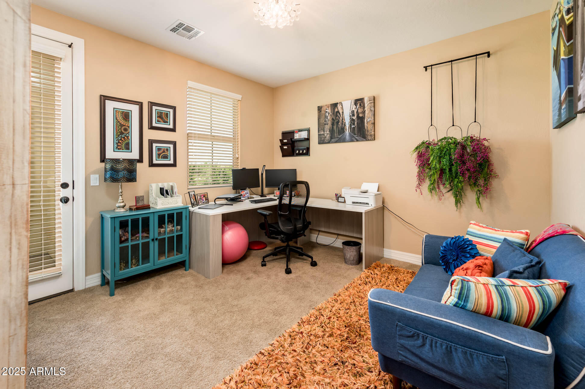 4836 South Covalent Lane Mesa, AZ 85212 - Photo 47 of 66 a living room with furniture and a window