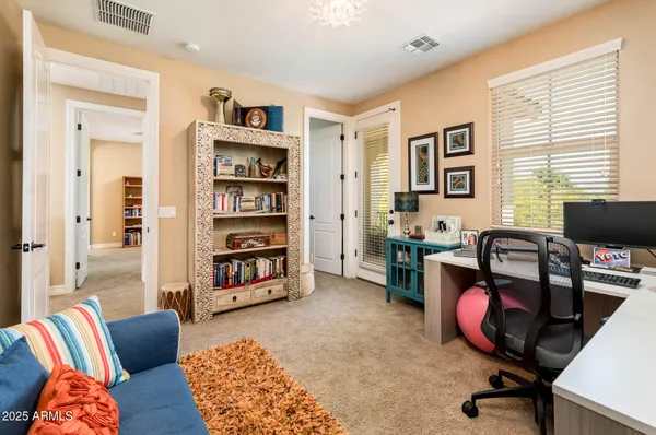 a view of a park with large trees