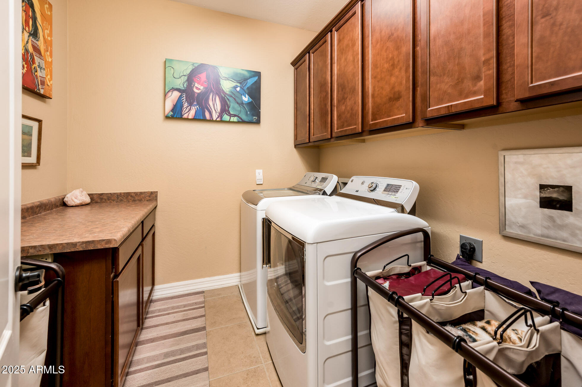 4836 South Covalent Lane Mesa, AZ 85212 - Photo 53 of 66 a utility room with dryer washer and a view of living room