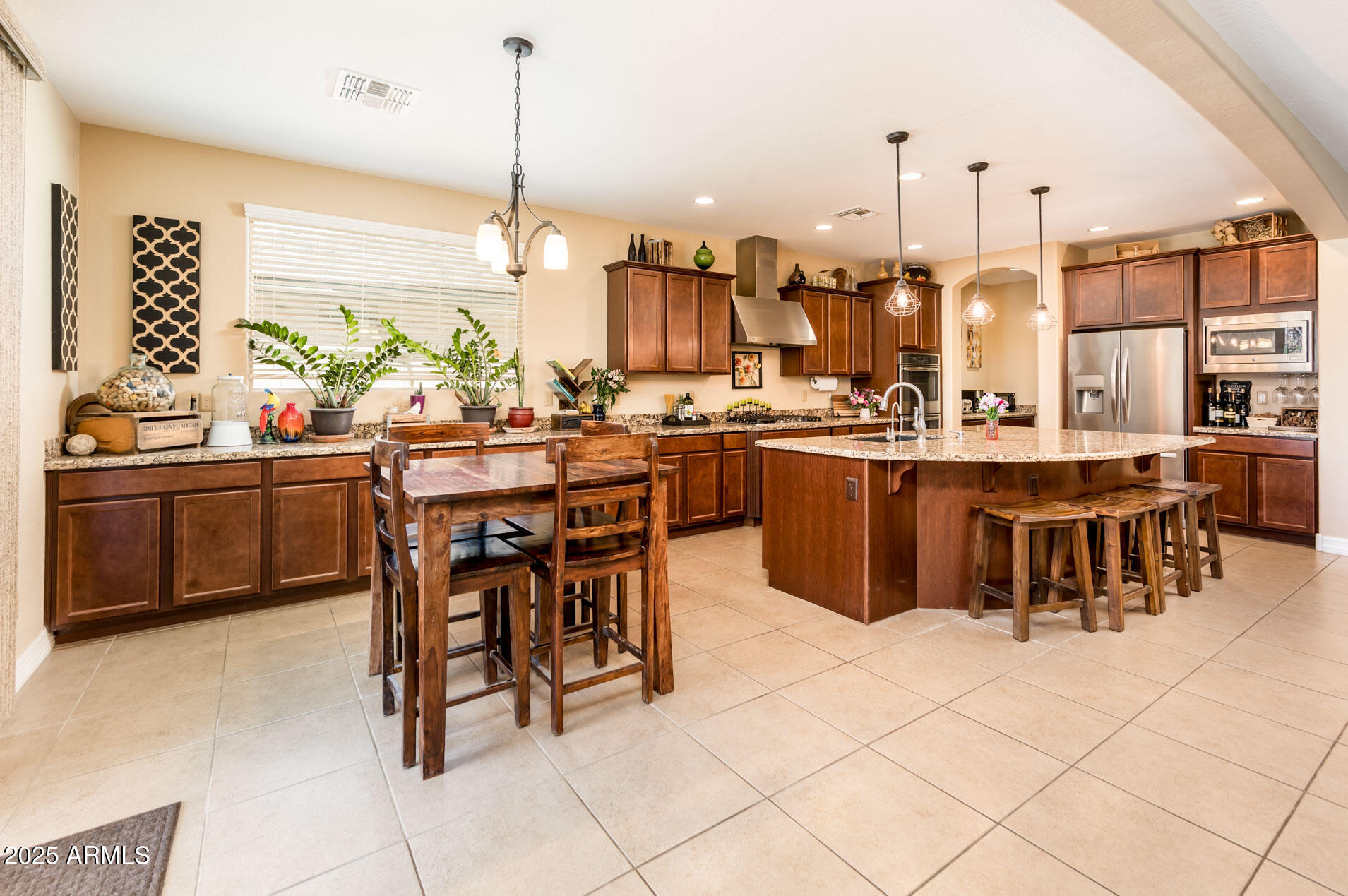 4836 South Covalent Lane Mesa, AZ 85212 - Photo 6 of 66 a view of a dining hall with furniture