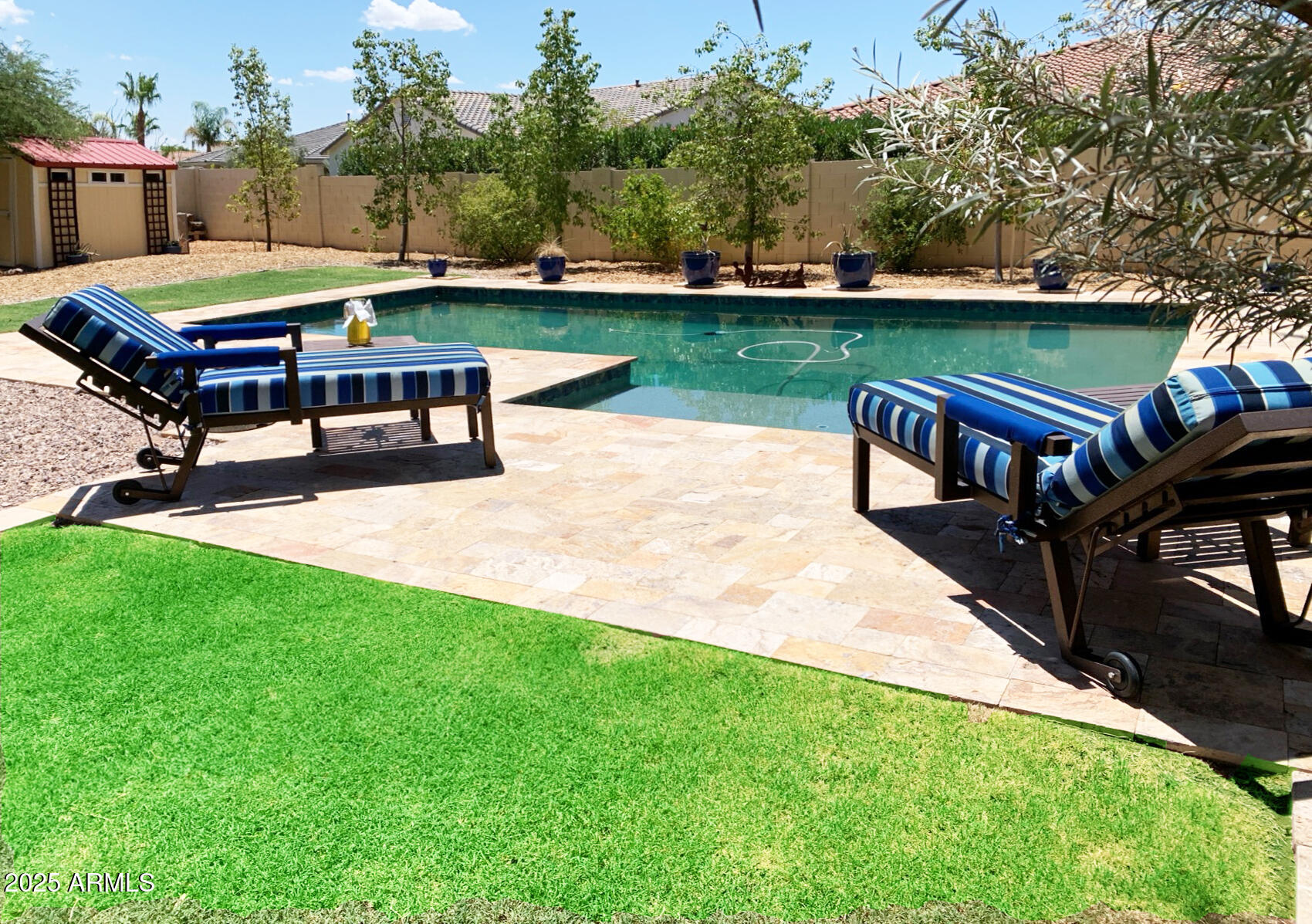 4836 South Covalent Lane Mesa, AZ 85212 - Photo 10 of 66 an outdoor sitting area with furniture and garden