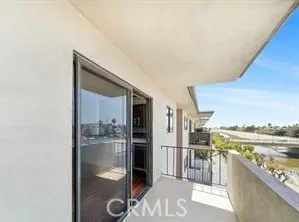 a view of a living room hardwood floor and a sink