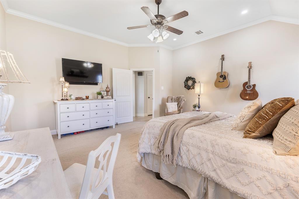 116 Miramar Circle Weatherford, TX 76085 - Photo 13 of 37 Bedroom with crown molding, light colored carpet, a ceiling fan, and recessed lighting