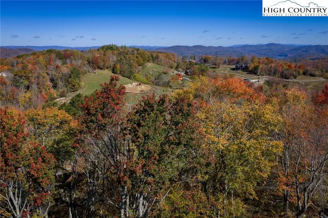 a view of a city with mountains in the background