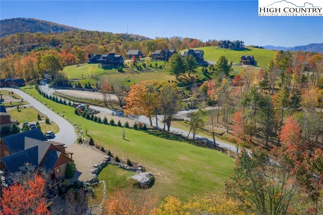 a view of a city with mountains in the background