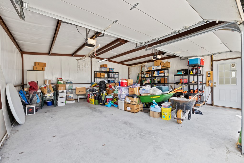 564 Gypsum Mine Road Fredericksburg, TX 78624 - Photo 18 of 20 a view of a storage room with a lot of stuff