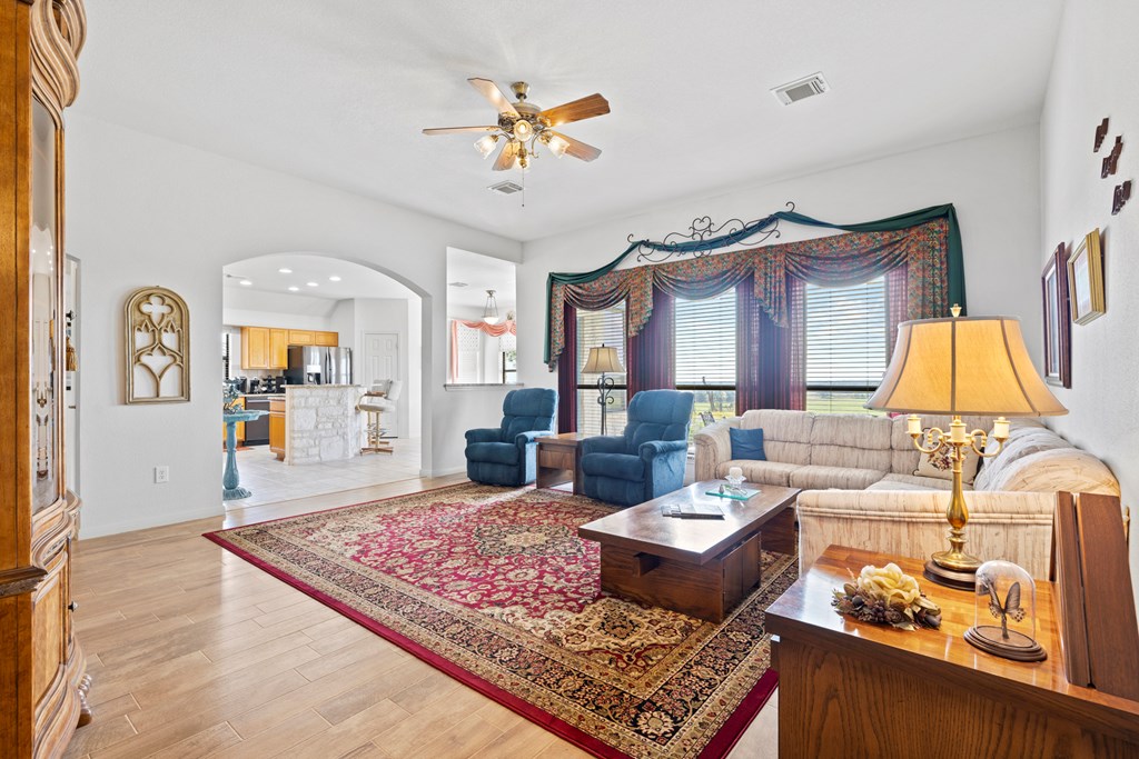 564 Gypsum Mine Road Fredericksburg, TX 78624 - Photo 2 of 20 a living room with furniture and a flat screen tv