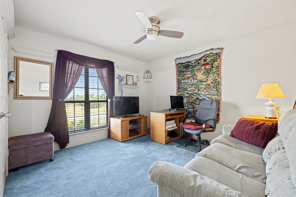 564 Gypsum Mine Road Fredericksburg, TX 78624 - Photo 9 of 20 a living room with furniture and a flat screen tv