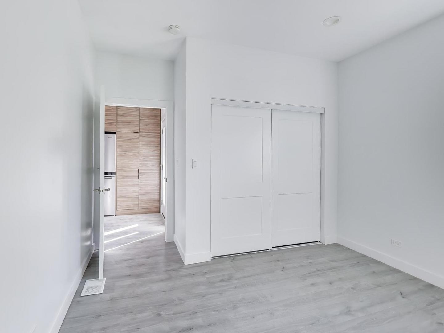 1721 West Arthur Avenue Chicago, IL 60626 - Photo 8 of 26 a view of an empty room