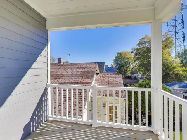 a view of a wooden roof deck