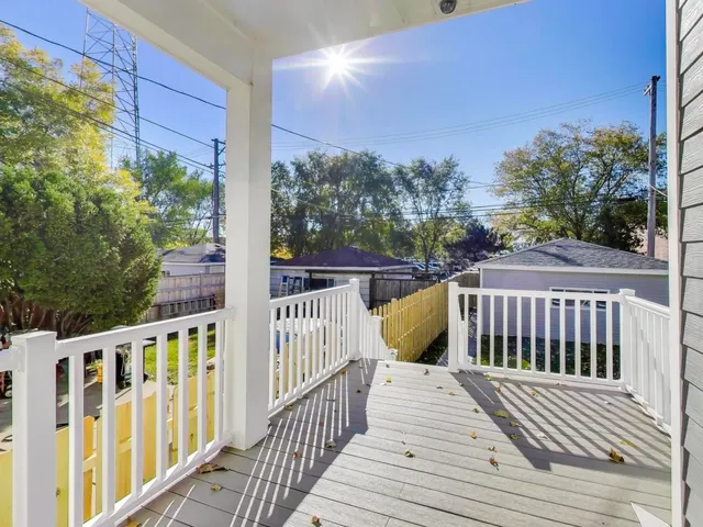 a view of a wooden roof deck
