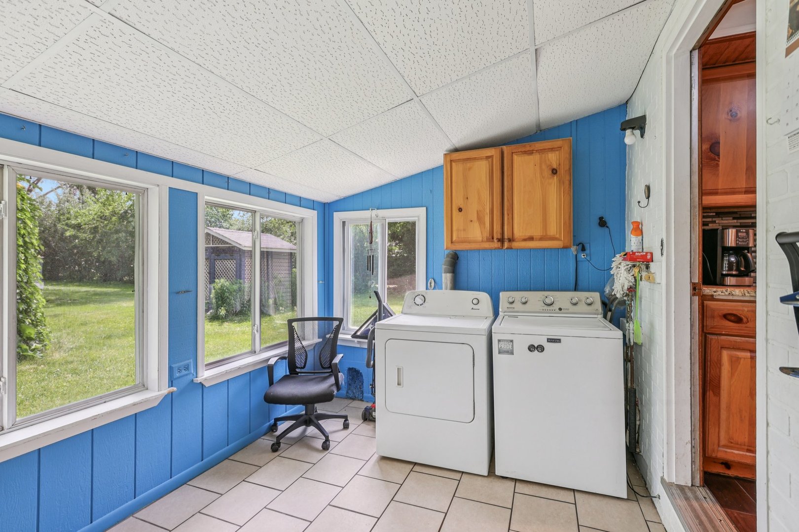 20214 Harmony Road Marengo, IL 60152 - Photo 18 of 56 a view of washer and dryer with bathroom in the background
