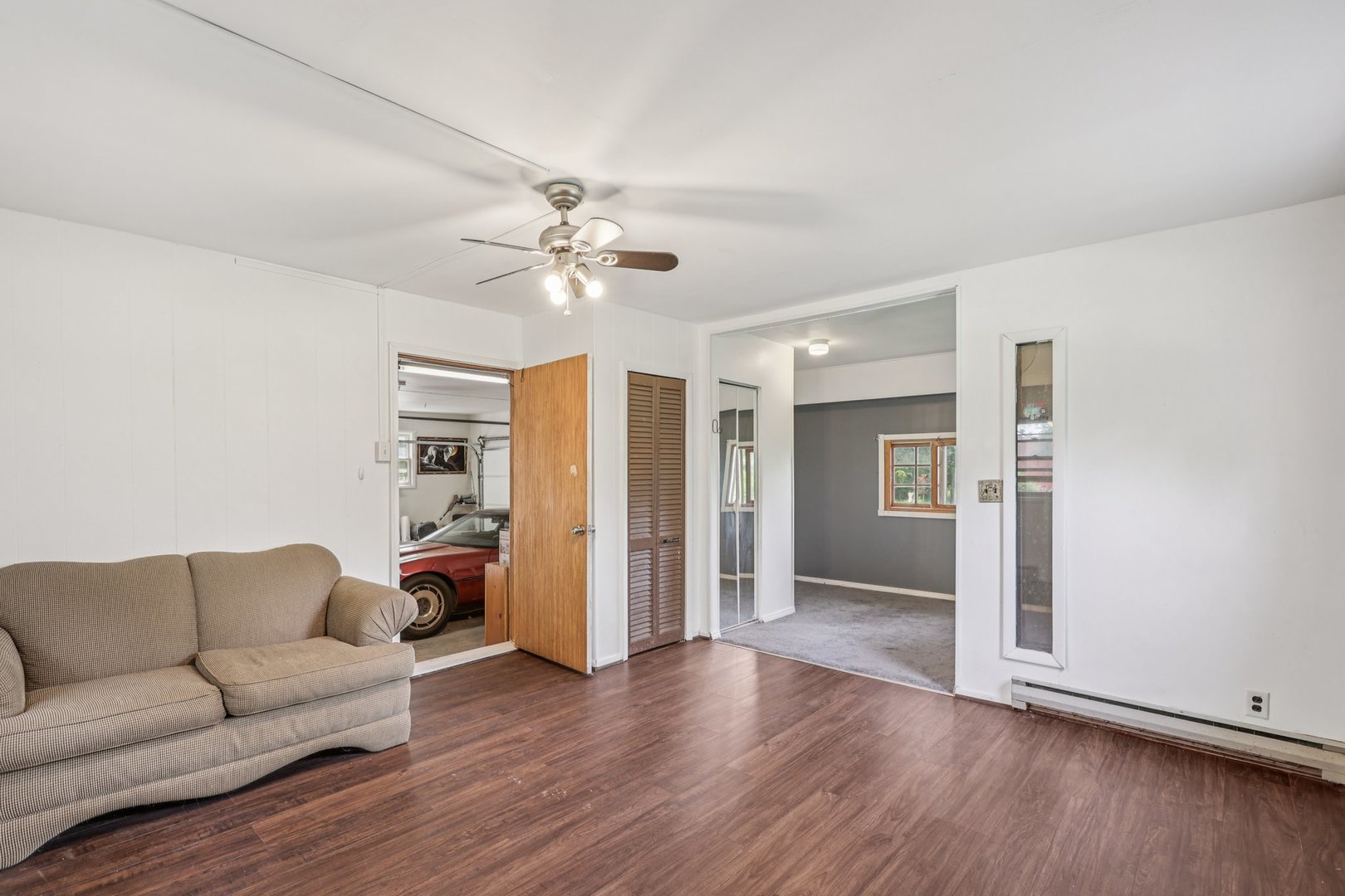 20214 Harmony Road Marengo, IL 60152 - Photo 19 of 56 a living room with furniture and wooden floor